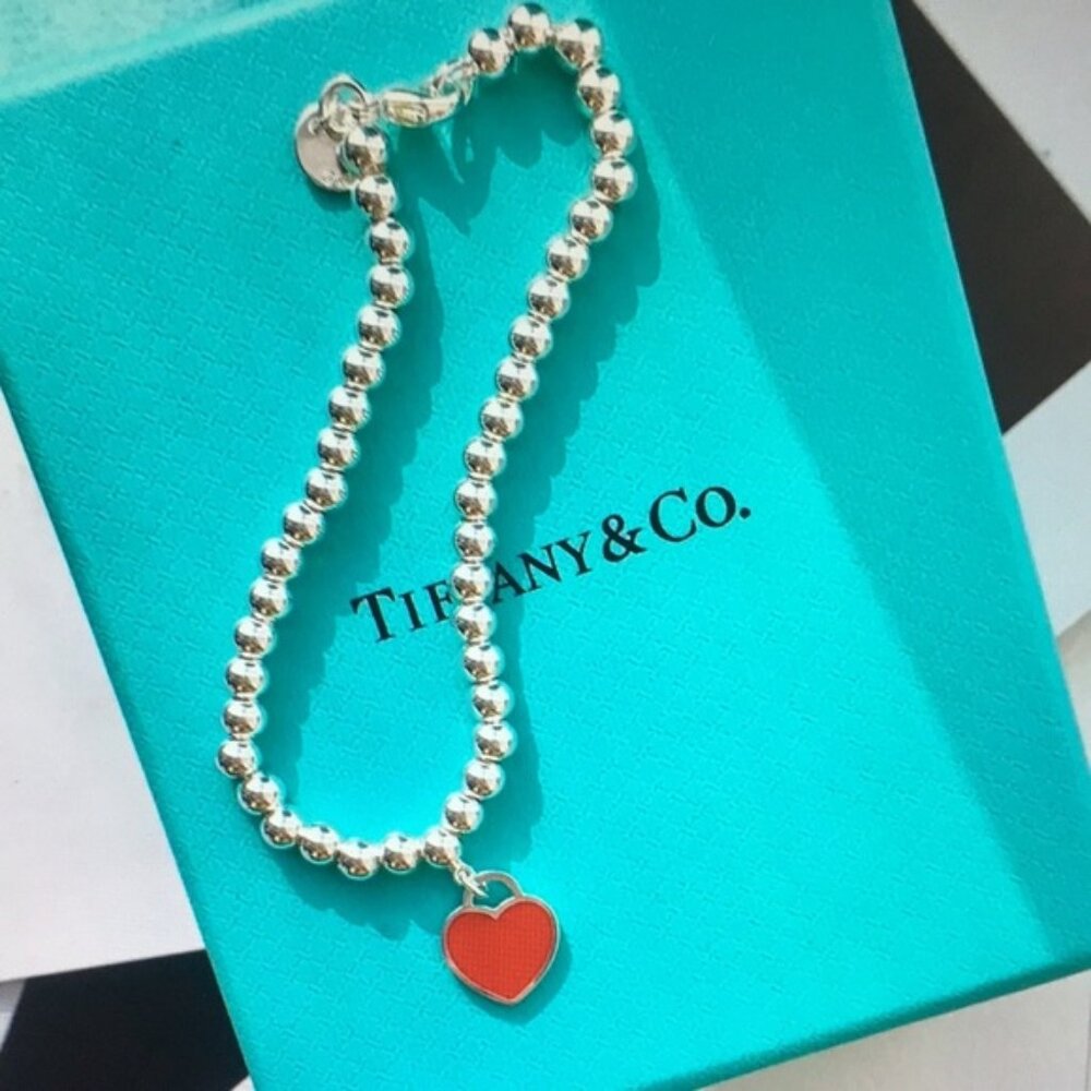 Tiffany & Co. Silver Bracelet with Red Heart Charm